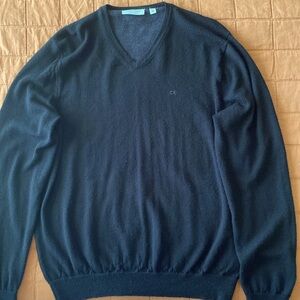 Calvin Klein . Italian merino, sweeter V neck solid black color